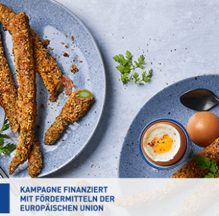 Weich gekochte Eier mit grünem Spargel und Bayonne-Schinken in Haselnusspanade